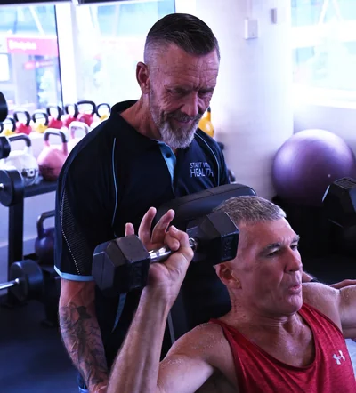 Personal trainer coaching a client at Start With Health Greensborough